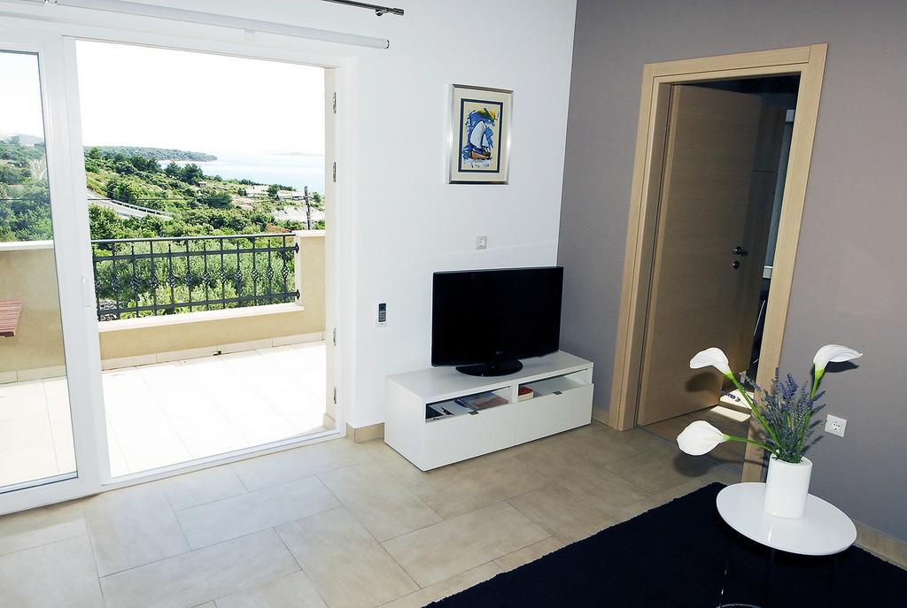 Apartments Maslina Примоштен Экстерьер фото