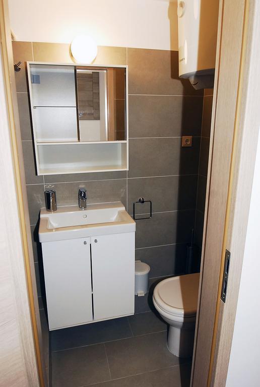 Apartments Maslina Примоштен Экстерьер фото
